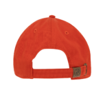 A bright red cap is viewed from the back revealing a strap for adjustment the background is plain black creating a stark contrast with the cap’s color