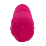 A vibrant pink baseball cap lies flat with its brim facing upwards showcasing its rounded top and textured fabric the background is plain and contrasts with the bright color of the cap