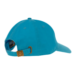 A blue baseball cap sits on a flat surface with its back visible showcasing an adjustable strap and a logo patch the interior features a label indicating the brand and care instructions