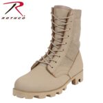 A tan military-style boot stands upright with laces secured and a rugged sole. The upper part features a combination of canvas and leather materials suitable for outdoor use.