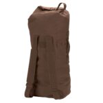 A brown cylindrical duffel bag stands upright showcasing sturdy shoulder straps and small side pockets while its top remains securely closed  suggesting readiness for travel or storage.