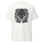 A white t-shirt features a large graphic design of a stylized face with glasses surrounded by swirling clouds and abstract elements depicting nature in a surreal black and white style.