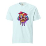 A light blue t-shirt displays a vibrant graphic of a skull with colorful mushrooms on top wearing headphones and dripping paint creating a lively and artistic design.