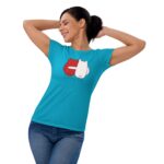 A woman is smiling and stretching her arms above her head while wearing a bright blue t-shirt featuring a playful graphic with the words FOREVER MINE on it. She is in a simple  neutral background.