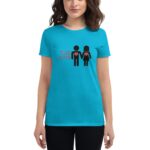 A person wears a turquoise t-shirt featuring black stick figures holding hands with red hearts on their chests alongside the text "TRUE LOVE" in a casual setting.