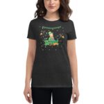 A dark gray t-shirt features a colorful design of a leprechaun surrounded by stars and party elements with the text St. Patrick's Day prominently displayed underneath the character.