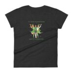 A graphic t-shirt features three cheerful characters wearing green outfits and accessories celebrating St. Patrick’s Day while holding their arms up with a backdrop of shamrocks and festive text. Text reads IT'S THE DAY OF GOOD FORTUNE HAPPY ST. PATRICK'S DAY