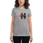 A woman wears a gray t-shirt featuring a graphic of two stick figures holding hands with red hearts in their chests alongside the text TRUE LOVE  standing against a neutral background.
