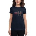 A person wears a navy blue t-shirt featuring two stick figures holding hands with red hearts on their chests and the text TRUE LOVE displayed beside them