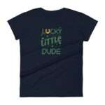 A dark navy t-shirt features the text "LUCKY LITTLE DUDE" in green with a yellow horseshoe graphic above the word "LUCKY " accented by stars and dots  conveying a playful theme.