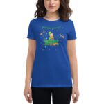 A blue t-shirt features a festive design with a leprechaun character and the text St. Patrick's Day surrounded by colorful stars and decorations suitable for celebrating the holiday.