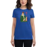 A woman wearing a blue t-shirt features an illustration of a figure dressed as Saint Patrick holding a staff with the text Saint Patrick 20 74 below the figure.