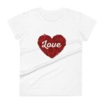 A white t-shirt displays a large red heart filled with intricate designs and the word Love in a flowing white font at its center.