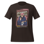 A black t-shirt features an illustrated character with pink hair and a mischievous expression holding a skull. Text in Japanese surrounds the character  emphasizing a theme of sorcery or curses.
