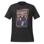 A black t-shirt displays a graphic of a character with pink hair and a playful expression holding a skull The background consists of bold text and colorful geometric designs