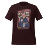 A dark maroon t-shirt features an illustration of a smiling character with spiky pink hair holding a skull in one hand with Japanese text in the background and a bordered design surrounding the character.
