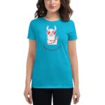 A woman wears a bright blue t-shirt featuring a cartoon llama in sunglasses with hearts around it and the text Happy Valentine’s Day underneath the design