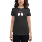 A woman wears a dark gray t-shirt featuring a cartoon design of two birds facing each other with hearts above them  suggesting a theme of love or affection.