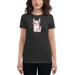 A woman is wearing a black t-shirt featuring a cartoon llama with heart patterns and sunglasses making a peace sign surrounded by the text Happy Valentine's Day.