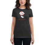 A woman wearing a dark t-shirt features a cartoon cat playfully holding heart-shaped balloons above it along with the text Happy Valentine's Day below the illustration