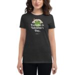 A woman stands wearing a dark t-shirt featuring the text "Everyday is Valentine's Day" surrounded by flowers demonstrating a positive and cheerful message in a casual setting.