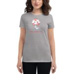 A gray t-shirt displays a cartoon cat surrounded by red and pink hearts with the text Happy Valentine's Day underneath showcasing a playful and festive theme suitable for the holiday