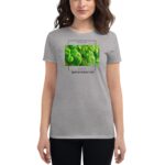 A person is wearing a gray t-shirt featuring a vibrant image of clovers along with the text "FEELIN' LUCKY HAPPY ST. PATRICK'S DAY" in a stylish layout.