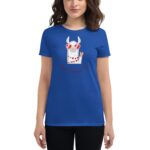 A woman wears a blue t-shirt featuring a cartoon llama with sunglasses and a peace sign  surrounded by red hearts and the text Happy Valentine's Day.