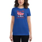A woman stands wearing a bright blue t-shirt featuring cartoon hearts holding hands with text above reading You & Me and below saying always together set against a checkered background.