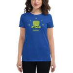 A woman wears a blue t-shirt featuring a green top hat and the text CHEERS with decorative clovers  suggesting a festive theme likely related to St. Patrick's Day.