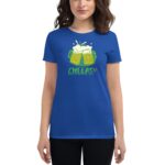 A woman is wearing a blue t-shirt featuring a graphic of two beer mugs with foam and the text CHEERS!! HAPPY ST. PATRICK'S DAY emphasizing a festive theme.