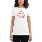 A person wears a white t-shirt displaying the text "HAPPY VALENTINE'S DAY" surrounded by floral designs  set against a plain background  conveying a festive mood.