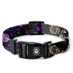 A decorative dog collar features a vibrant floral pattern with purple and black roses and green leaves The collar includes a black buckle and a metal D-ring for leash attachment