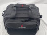 A black tactical bag with multiple zippered compartments rests on a light background featuring a logo that reads ADVANCE WARRIOR SOLUTIONS positioned prominently on the front.