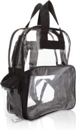 A clear backpack made of transparent plastic with black fabric accents is displayed upright with zippers and handles visible showcasing its compartments in a simple clean setting.