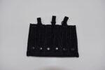 A black tactical gear panel features multiple vertical slots for holding items secured by snaps and strings on a plain light background  indicating a functional design for carrying equipment.