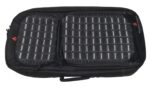 A black padded bag with two zippered compartments has a grid pattern and a red logo on one side. It is designed for storage and transport of equipment in various environments.