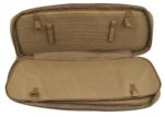 A tan padded bag is open displaying an interior with a textured surface and retaining straps while the main compartment appears flat and smooth designed for storage or protection of equipment.