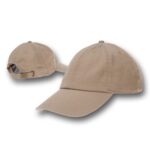 A beige baseball cap is positioned upright and slightly turned showing the front and back views with a curved brim and fabric strap for adjustment on the back.