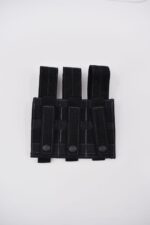 A black tactical pouch features three loops secured with buttons designed to hold equipment or tools resting flat against a white background.