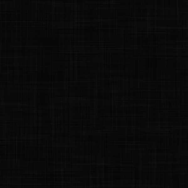 A textured black surface displays subtle variations in shade and pattern suggesting a woven or layered material creating a dark and minimalist aesthetic in an undefined space.