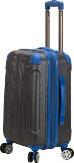 A hard-shell suitcase with a black textured surface and blue accents stands upright on four wheels featuring a retractable handle ready for travel in an indoor setting.