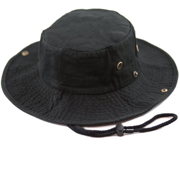 A black bucket hat sits upright showcasing its wide brim and textured fabric with metal eyelets and a drawstring for securing it under the chin in outdoor settings.