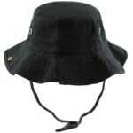 A black bucket hat rests upright featuring a wide floppy brim and eyelets on the sides with a chin strap attached for security during outdoor activities.