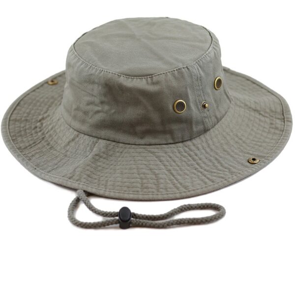 A wide-brimmed bucket hat with a soft fabric texture features brass eyelets and a rope chin strap designed for outdoor protection from sun and rain in casual environments.