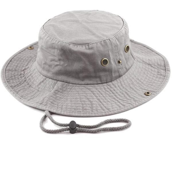 A gray bucket hat rests flat with a wide brim and ventilation grommets on the sides facing upwards while a drawstring is attached for adjustment and secure fit.