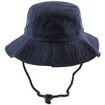 A navy blue bucket hat with a wide brim and tie strap features ventilation eyelets on the sides designed for outdoor wear in sunny or rainy conditions.