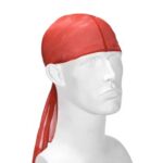 A red durag is positioned on a white mannequin head the fabric is smooth and slightly sheer with long tails hanging down suggesting an accessory for hair management or style in a fashion context