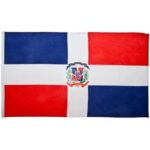 A rectangular flag features a blue and red design with a central white cross. The national coat of arms is placed at the center within the cross.