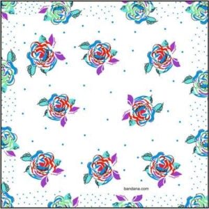 A patterned fabric features colorful rose motifs in shades of red blue and pink scattered across a white background with small blue polka dots creating a vibrant textile design.